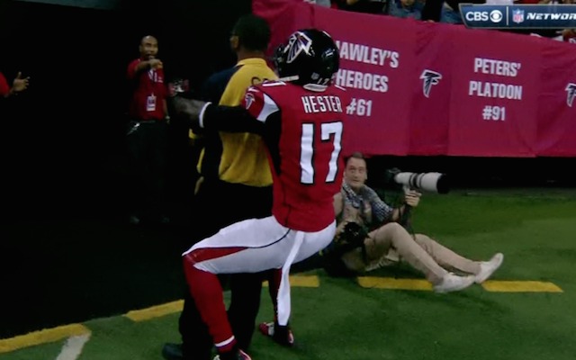 Devin Hester was handing out hugs after breaking an NFL record on Thursday. (CBS)
