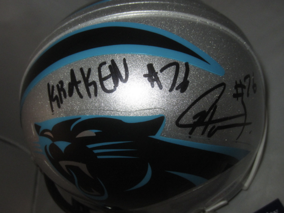 Hardy refuses to sign helmet, gives fan $100