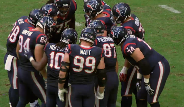 J.J. Watt has no idea what's going on in the offensive huddle. (HoustonTexans.com)
