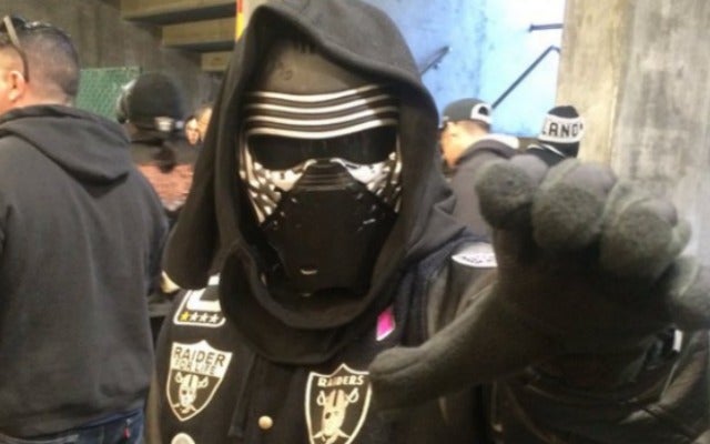 Fan in Kylo Ren garb attends Chargers-Raiders