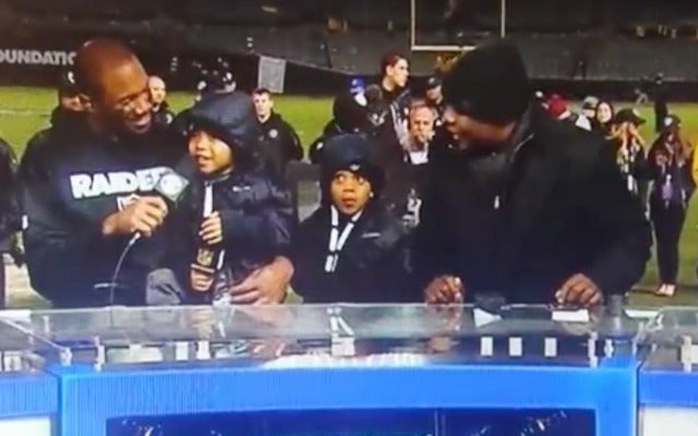 Woodson's son steals show at postgame presser