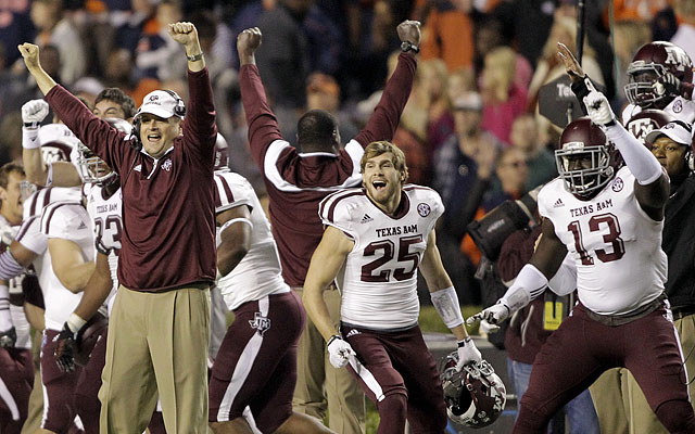 Texas A&M celebrates after recovering a fumble in the final minute of the game. (USATSI)