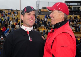 Jim Harbaugh (left) and John Elway have some issues to discuss (US Presswire).