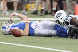 M. Stafford injured his throwing shoulder again today (US Presswire).
