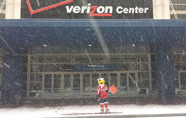 The Caps mascot shovels around Verizon Center. (Facebook)