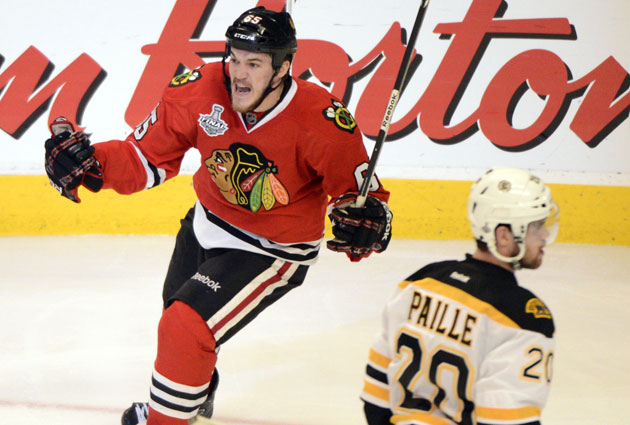 Andrew Shaw celebrates his goal in the third overtime for Chicago. (USATSI)