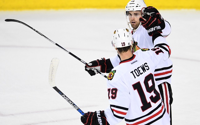 Andrew Ladd and Jonathan Toews connected for a late game-winner against the Canucks. (USATSI)