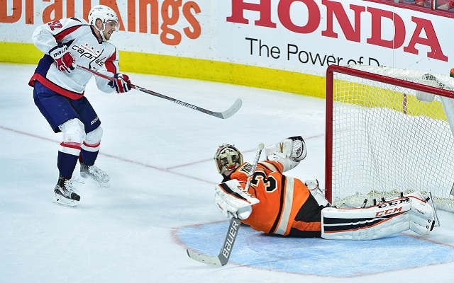 Steve Mason robbed Evgeny Kuznestov in the shootout. (USATSI)