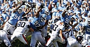 Robert McAdoo (94) and Aleric Mullins (97) and Tydreke Powell (91) and Quinton Coples (90) (US Presswire)