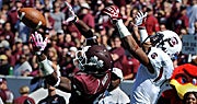 Johnthan Banks (13) breaks up a pass intended for South Carolina Gamecocks wide receiver Damiere Byrd (3) (US Presswire)
