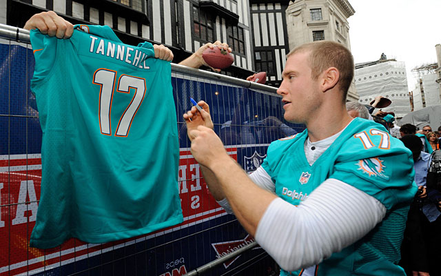 Miami Dolphins quarterback Ryan Tannehill signs an autograph for a fan in London. (USATSI)