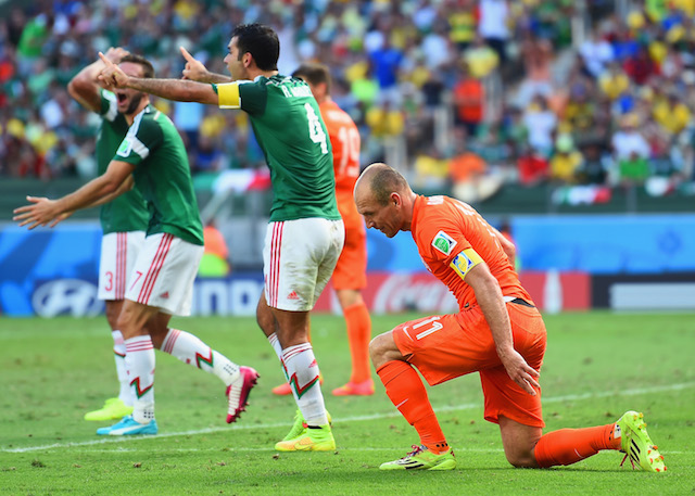The reaction after Arjen Robben drew a penalty in the final minutes. (Getty Images)