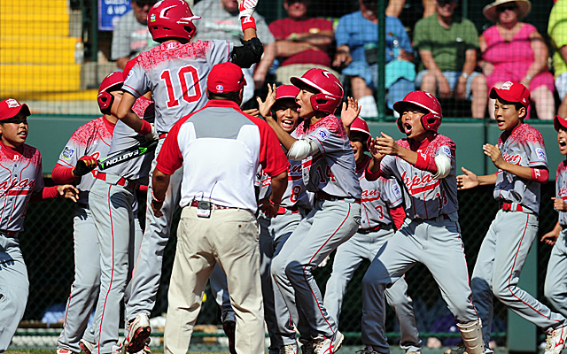 Japan celebrates a home run in Sunday's championship game.