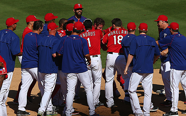 The Rangers celebrate Josh Hamilton's game-winner.