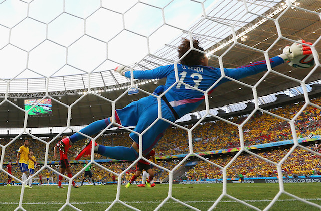 Guillermo Ochoa had the save of the tournament so far, denying Neymar's header. (Getty Images)