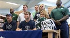 Rice signs player heart condition
