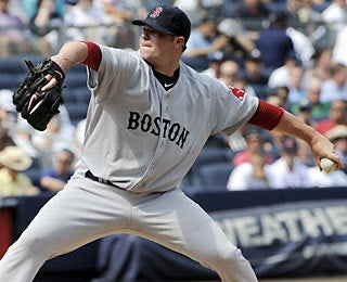 Jon Lester riddles the Yankees lineup before leaving the game after 6 1/3 shutout innings.  (AP)