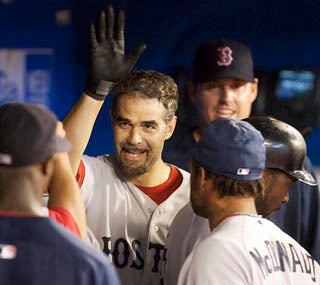 Mike Lowell gives the Red Sox the lead with his 8th-inning solo home run. (AP)