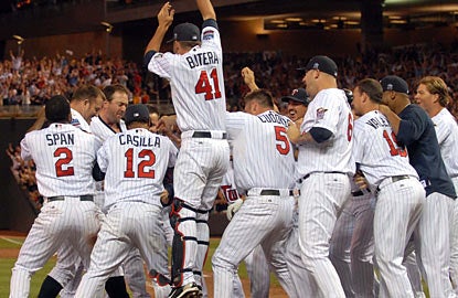Jim Thome (second to left) comes up with his 12th career walk-off home run while also creeping up the all-time HR list.  (AP)