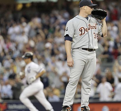 Mark Teixeira takes a trip around the bases after taking a pitch from Tigers starter Jeremy Bonderman out of the park.  (AP)