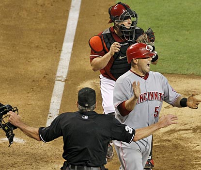 Ramon Hernandez is pumped up as the Reds mount a late-inning comeback against the Diamondbacks.  (AP)
