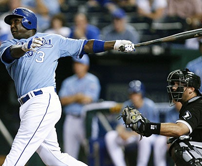 Yuniesky Betancourt hammers the ball a long way for his third grand slam of the season. (AP)