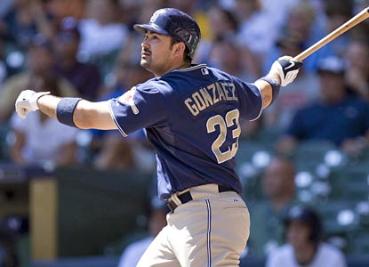 Adrian Gonzalez admires his 25th home run on the season, a solo shot in the first inning.  (US Presswire)