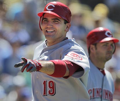 Joey Votto continues his push toward the Triple Crown with a home run and three more RBI.  (AP)