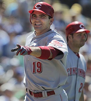 After enduring emotional and physical woes in 2009, Joey Votto has good reason to smile this season. (AP)