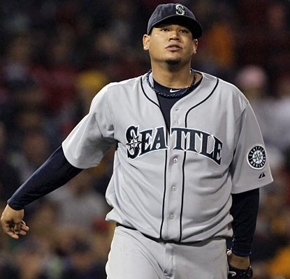 Mariners ace Felix Hernandez strikes out nine, in the process reaching the 1,000-strikeout milestone at the age of 24.  (AP)