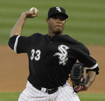 Caption Edwin Jackson reaches back to find something special as he strikes out 10 during a commanding performance.  (AP)