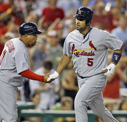 Albert Pujols reaches the 400-homer mark faster than anybody outside of Alex Rodriguez and Ken Griffey Jr.  (AP)