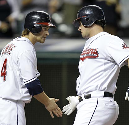 Trevor Crowe greets Matt LaPorta after LaPorta clubs a go-ahead two-run homer.  (AP)