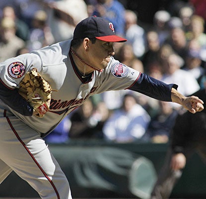 Brian Fuentes is comfortable in his new threads, getting the final out for his 24th save this season.  (AP)