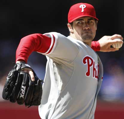 Cole Hamels retires his final 16 batters to lead the Phils past the stumbling, NL West-leading Padres. (AP)