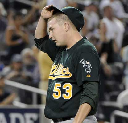 Trevor Cahill looks dejected after allowing back-to-back home runs in the third to Mark Teixeira and Robinson Cano. (AP)
