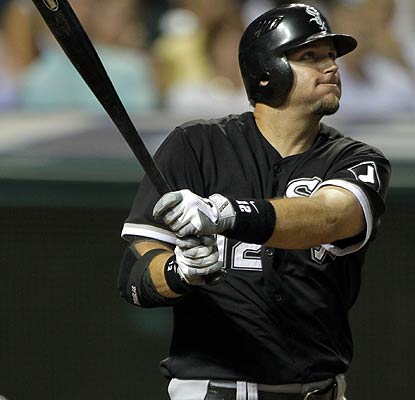 A.J. Pierzynski hits a three-run homer in the ninth with Manny Ramirez waiting to make his White Sox debut as a pinch hitter. (AP)