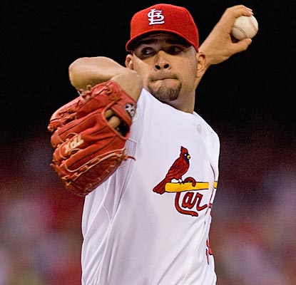 For the fourth time this season, rookie Jaime Garcia gets the best of the division-leading Reds.  (Getty Images)