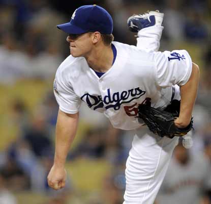 Chad Billingsley pitches a dominant game and knocked in a two-run single in the fourth to lead the Dodgers over the Giants.  (AP)