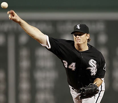 Gavin Floyd helps Chicago win Game 2 of the day-night doubleheader as well as gain a half-game in the AL Central. (AP)