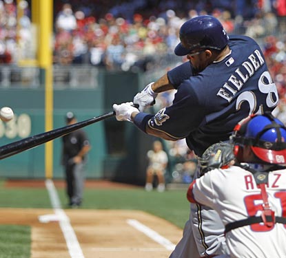 Prince Fielder puts a charge into a Kyle Kendrick pitch, hammering out his 30th home run of the season.  (AP)