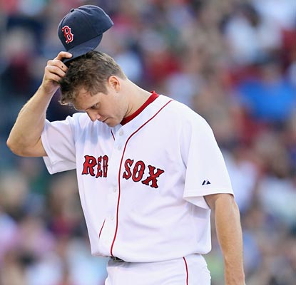 Jonathan Papelbon is left scratching his head after blowing the save with just one out to go.  (Getty Images)
