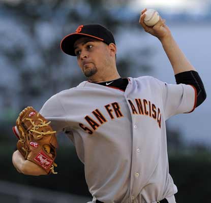 Jonathan Sanchez hurls seven solid in a win over the Dodgers -- a victory that puts them one game out of first in the NL West.  (AP)