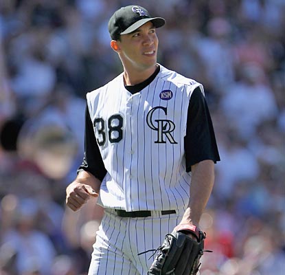 Ubaldo Jimenez picks up his 18th win of the season to set a new franchise record for the Rockies.  (Getty Images)