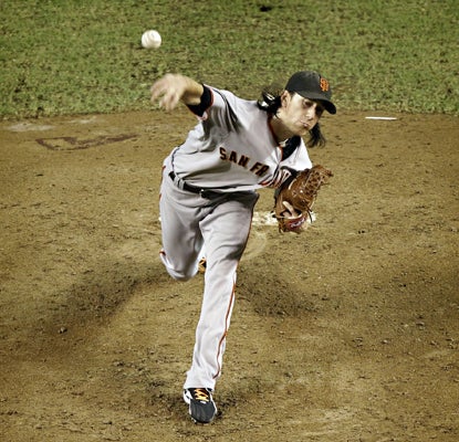 Tim Lincecum strikes out 11 to defeat the Diamondbacks and keep the pressure on the NL West-leading Padres. (Getty Images)