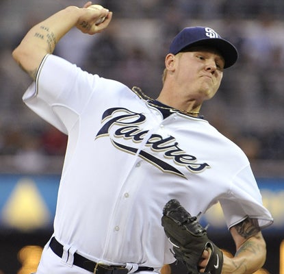 Mat Latos strikes out 10 against the Dodgers, and suddenly the once-struggling Padres see a little light.  (AP)
