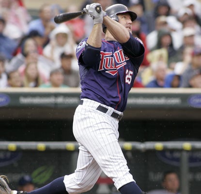 Jim Thome swings through home run No. 586, tying him with Frank Robinson on the all-time HR list.  (AP)
