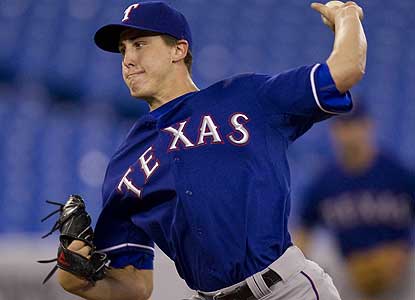 Derek Holland pitches five scoreless innings and picks up his first win since May 17. He also helps Texas end a five-game skid. (AP)