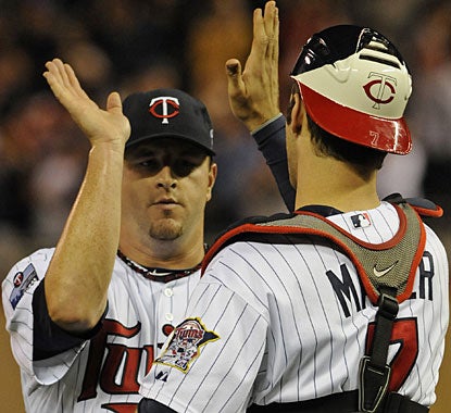 Matt Capps does give up two runs in the ninth, but gets Mitch Maier to fly out for his 11th save in 13 tries in Minnesota. (AP)