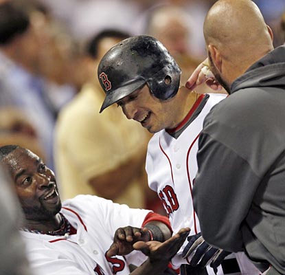 Bill Hall and Kevin Youkilis are happy with Marco Scutaro (center) and his two-homer night.  (AP)